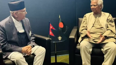 प्रधानमन्त्री ओली र बंगलादेशका अन्तरिम सरकार प्रमुख डा. युनुसबीच भेटवार्ता